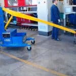 Electric crane for handling molds in the tire production sector.